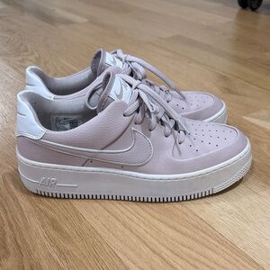 Nike Women's Soft Pink and White Sneakers